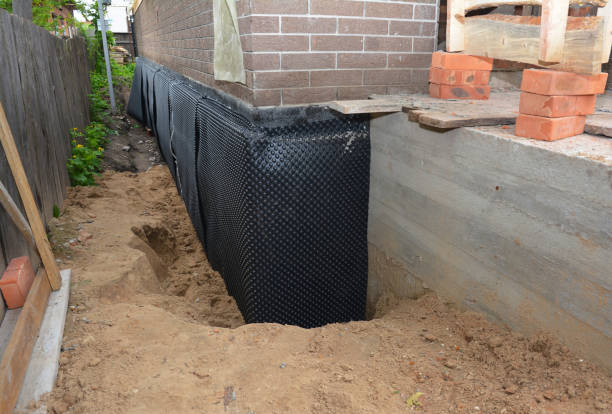 SJ Waterproofing Pros technician performing targeted Waterproofing assessment in Port Gibson, NY